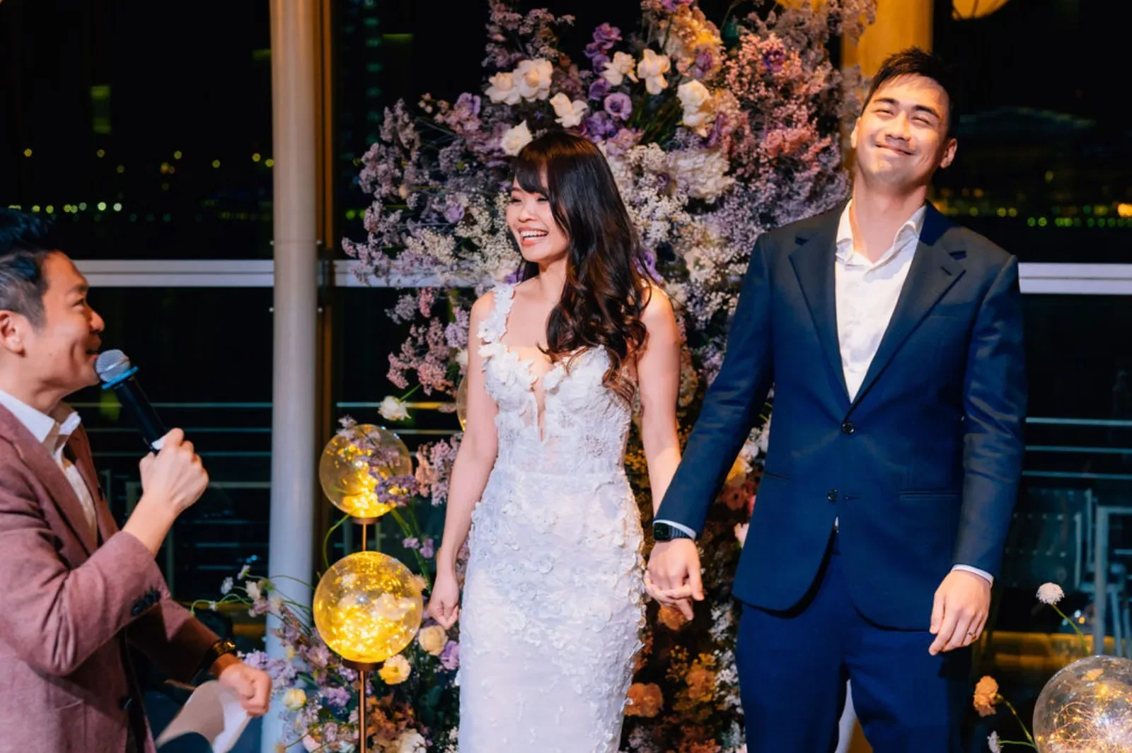 James Yang hosting a wedding dinner on a rooftop in Singapore