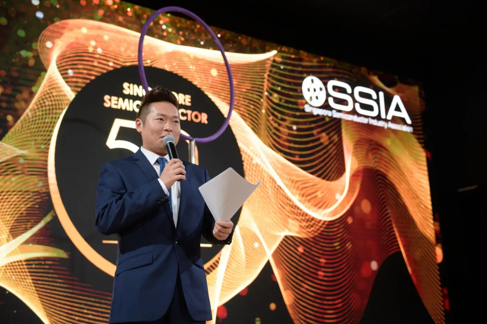 James Yang hosting an SSIA award night